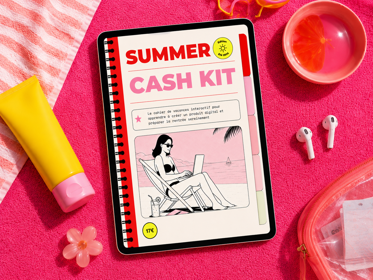 Aperçu du cahier Summer Cash Kit sur une serviette rose avec des accessoires d'été